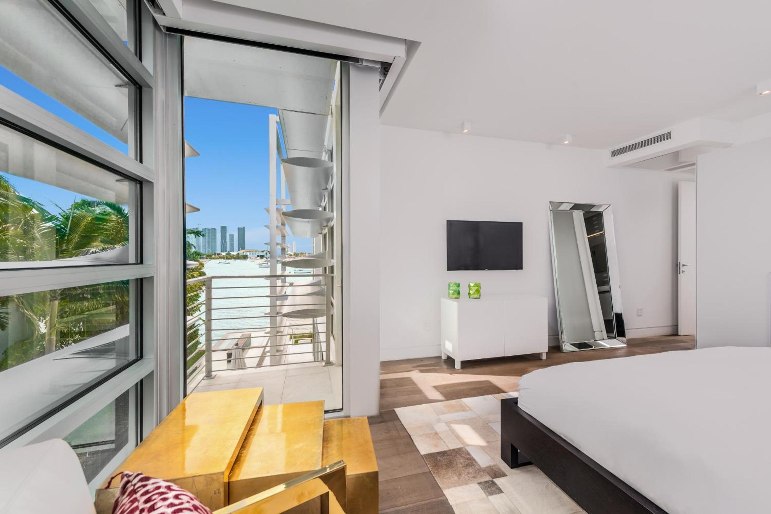 Indulge in Waterfront Elegance Your Ultra Luxury Miami Beach Estate Beckons!