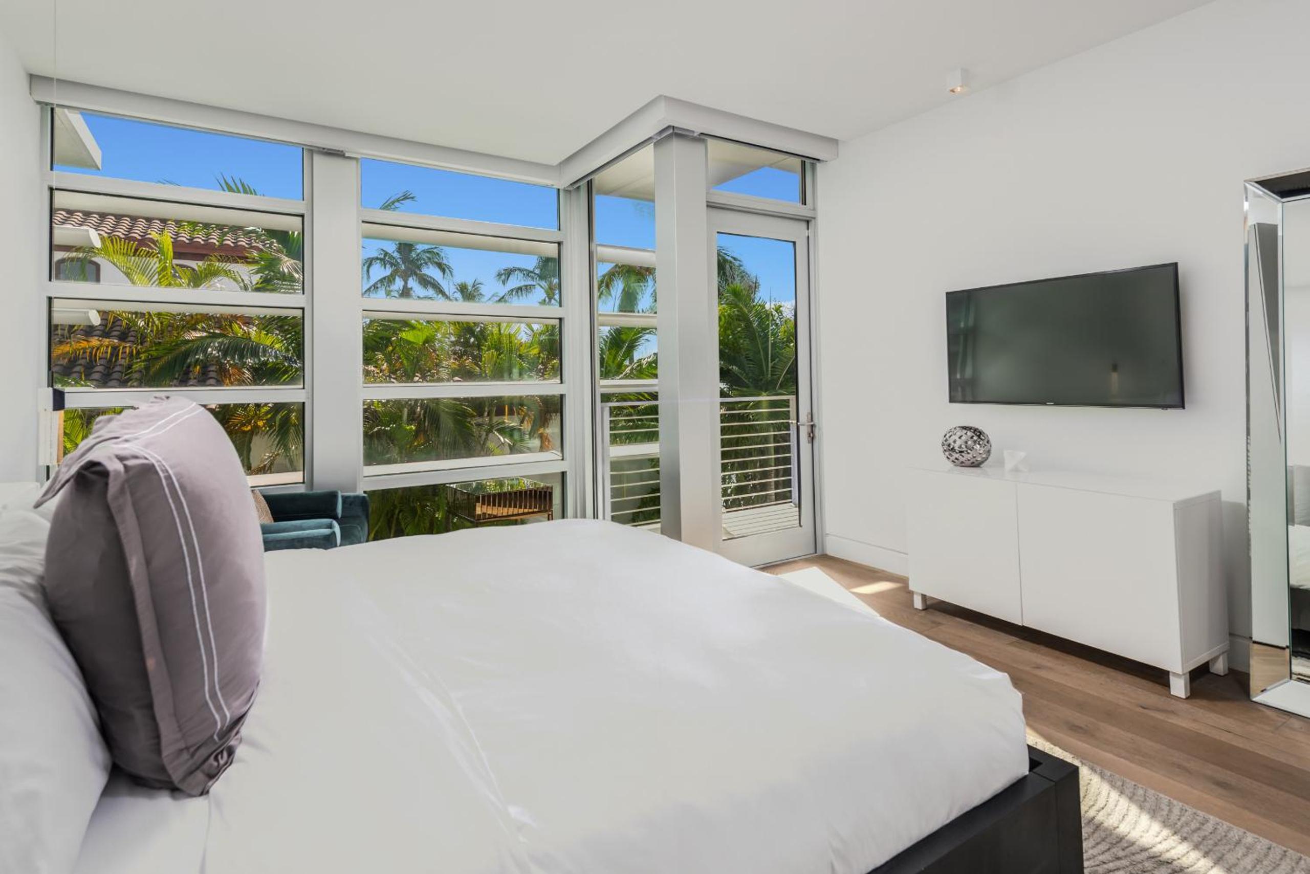 Indulge in Waterfront Elegance Your Ultra Luxury Miami Beach Estate Beckons!