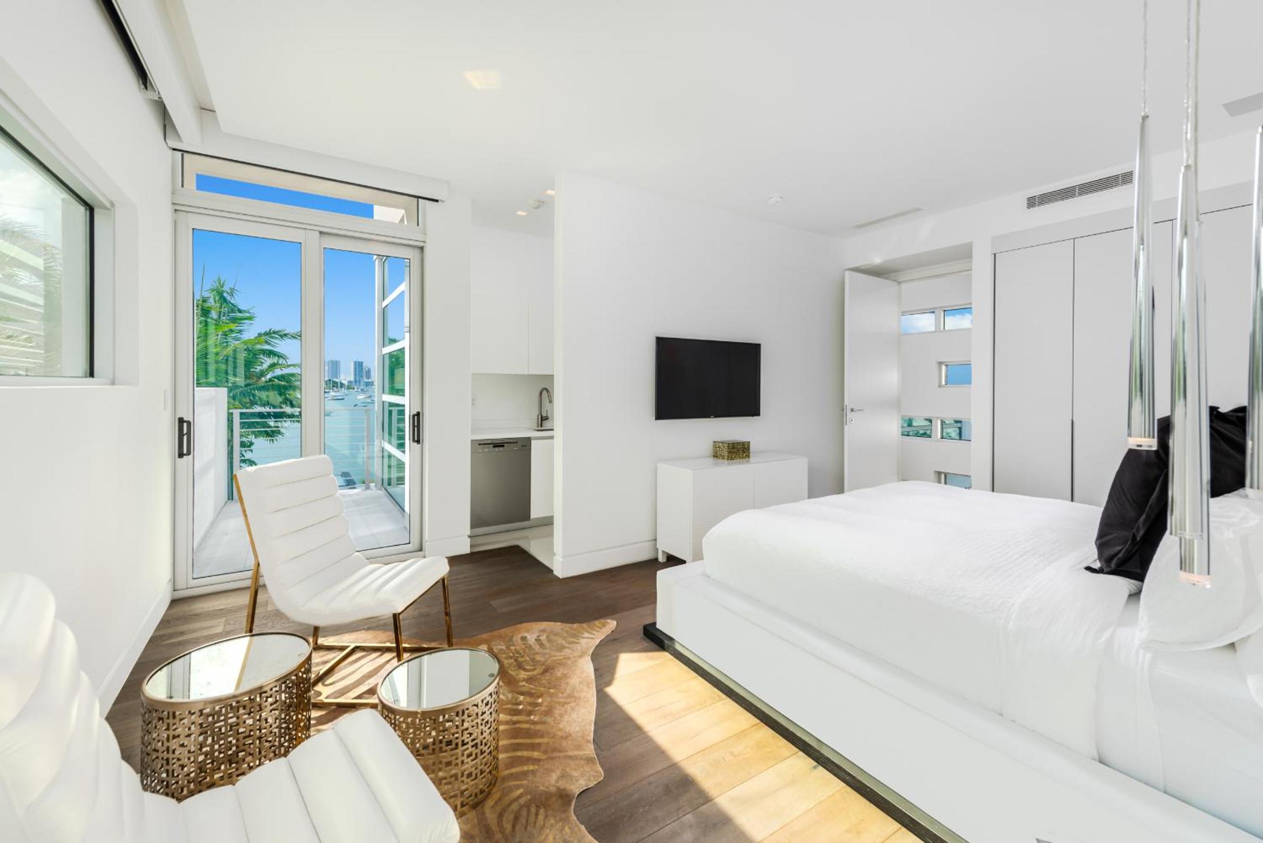 Indulge in Waterfront Elegance Your Ultra Luxury Miami Beach Estate Beckons!