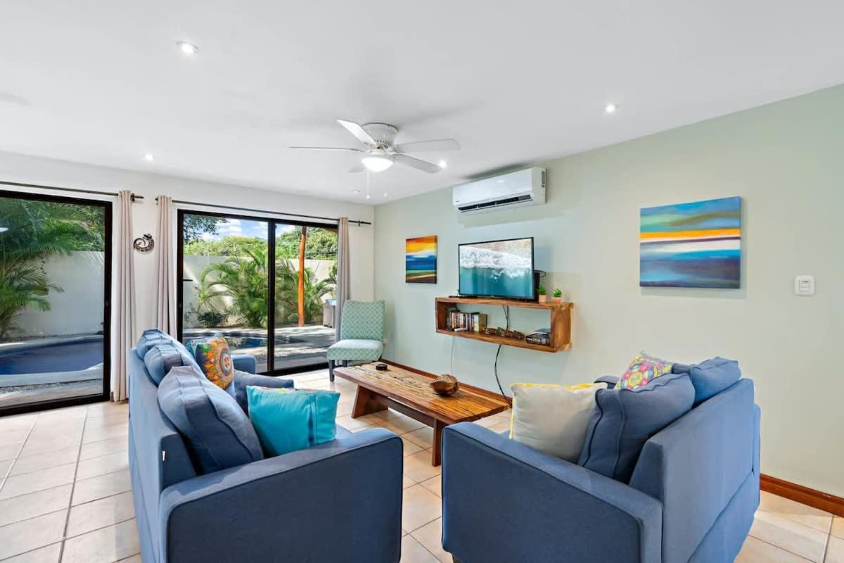 Inviting Home with Colorful Decor and Private Backyard Oasis with a Swimming Pool & Shaded Terrace