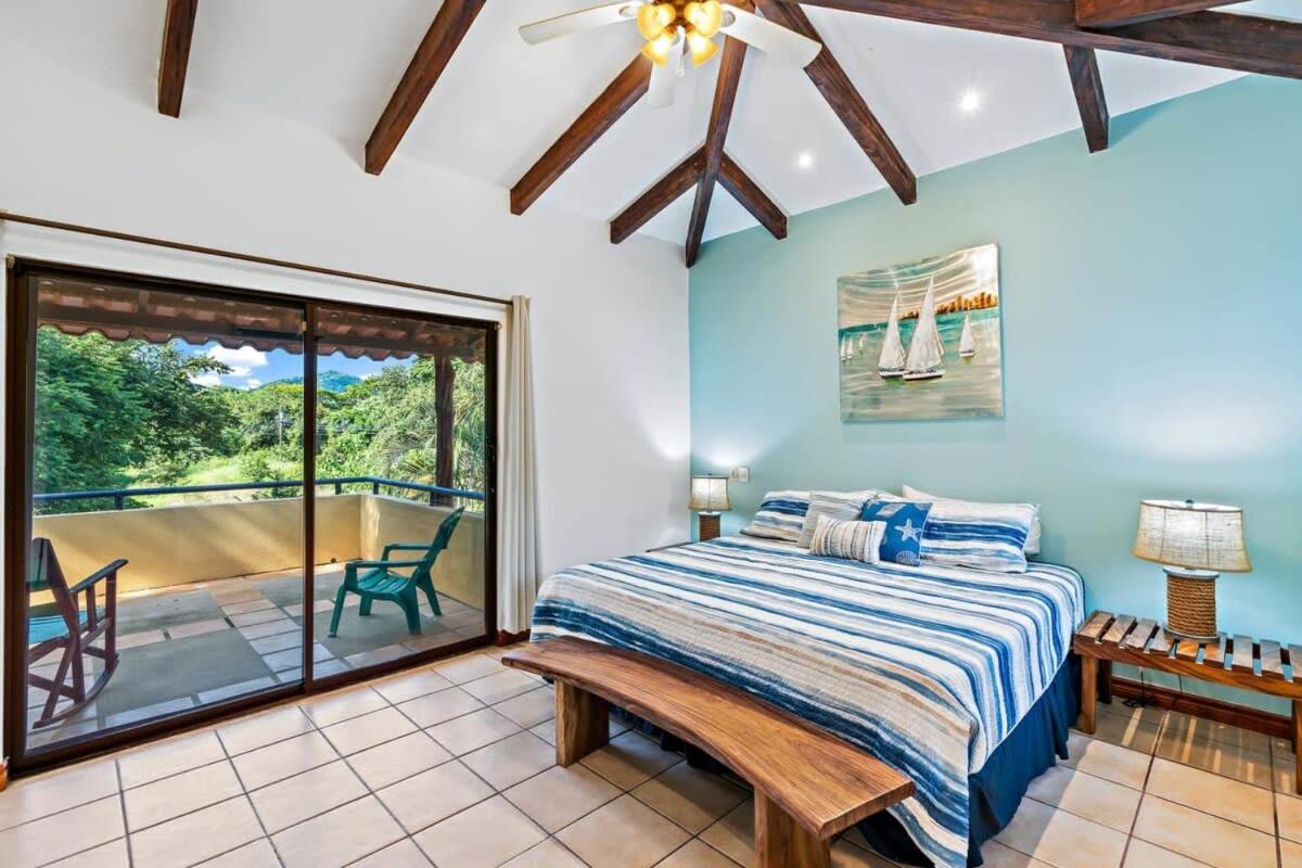 Inviting Home with Colorful Decor and Private Backyard Oasis with a Swimming Pool & Shaded Terrace