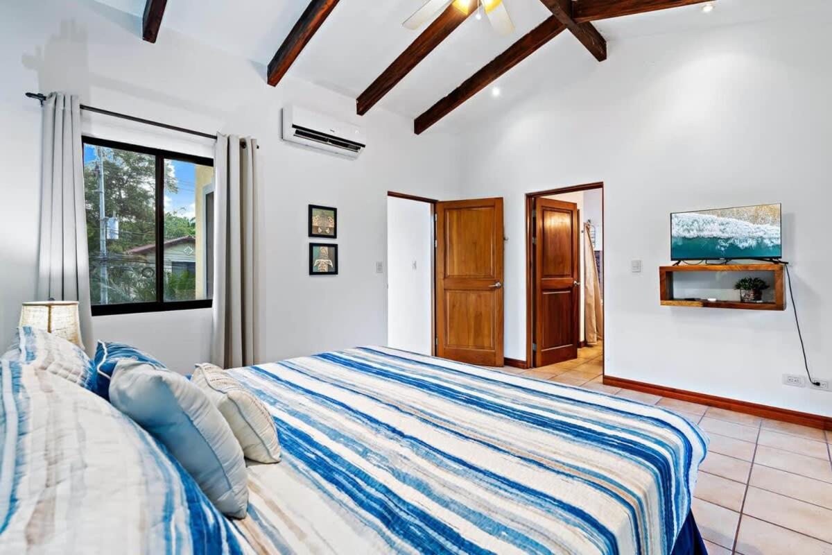 Inviting Home with Colorful Decor and Private Backyard Oasis with a Swimming Pool & Shaded Terrace