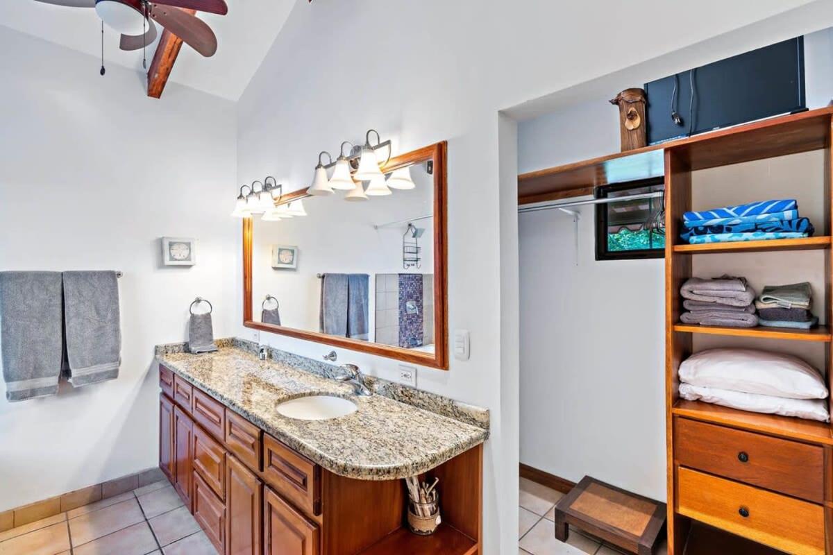 Inviting Home with Colorful Decor and Private Backyard Oasis with a Swimming Pool & Shaded Terrace