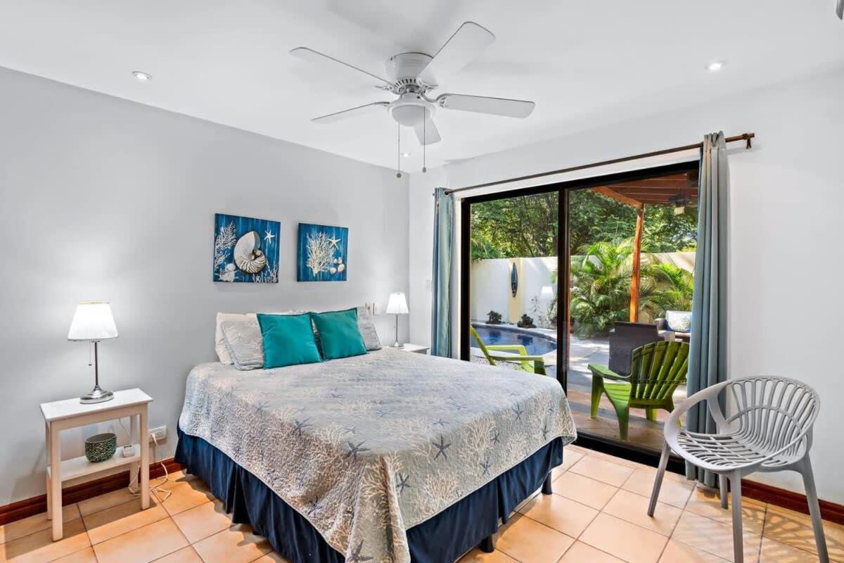 Inviting Home with Colorful Decor and Private Backyard Oasis with a Swimming Pool & Shaded Terrace