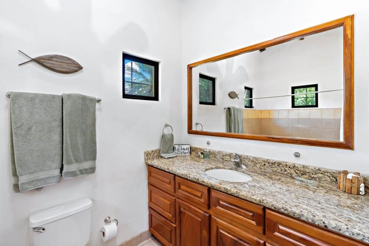 Inviting Home with Colorful Decor and Private Backyard Oasis with a Swimming Pool & Shaded Terrace