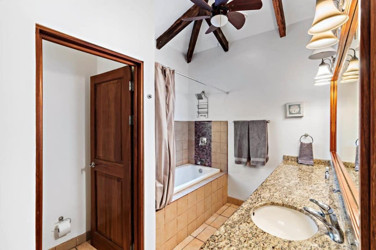Inviting Home with Colorful Decor and Private Backyard Oasis with a Swimming Pool & Shaded Terrace