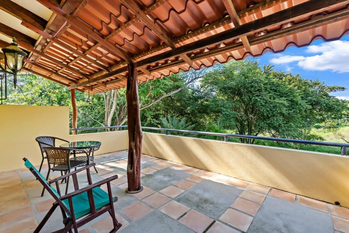 Inviting Home with Colorful Decor and Private Backyard Oasis with a Swimming Pool & Shaded Terrace