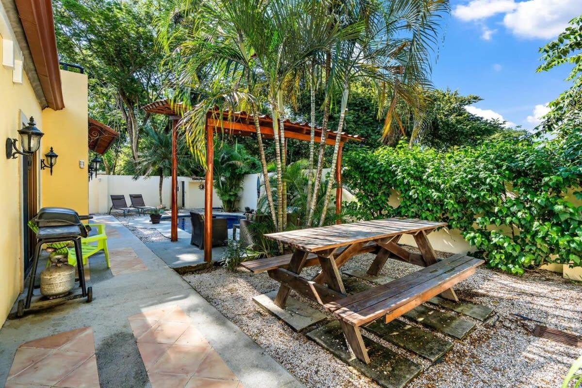 Inviting Home with Colorful Decor and Private Backyard Oasis with a Swimming Pool & Shaded Terrace