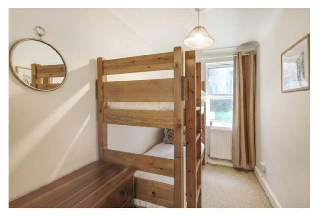 Central 2 bedroom garden flat with free parking view 3
