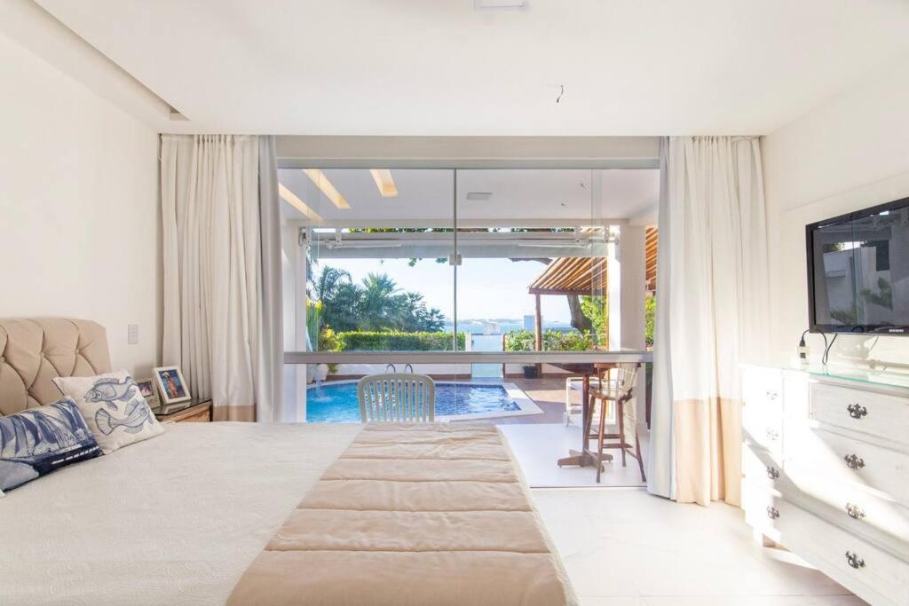 Porto Brasil resort, beira mar, casa com 4 suítes, piscinas