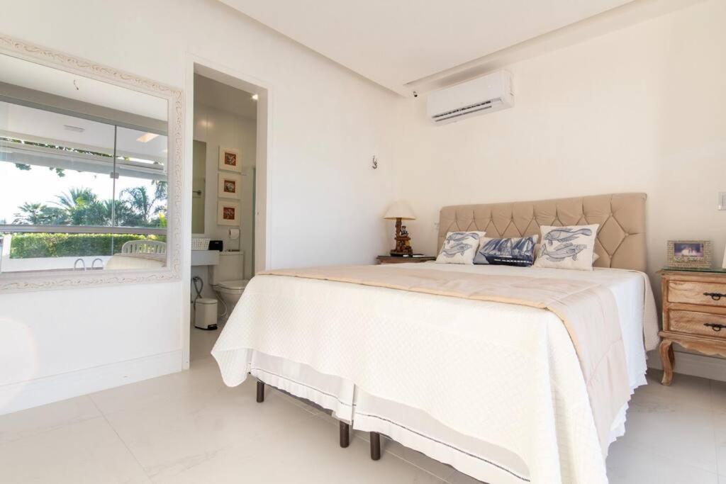 Porto Brasil resort, beira mar, casa com 4 suítes, piscinas