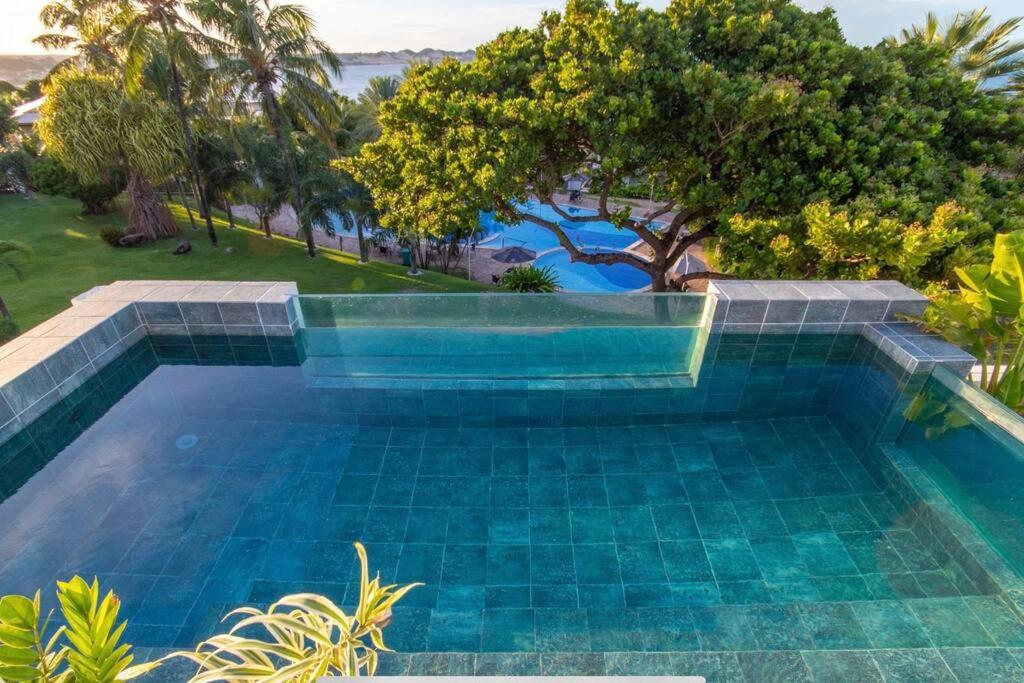 Porto Brasil resort, beira mar, casa com 4 suítes, piscinas