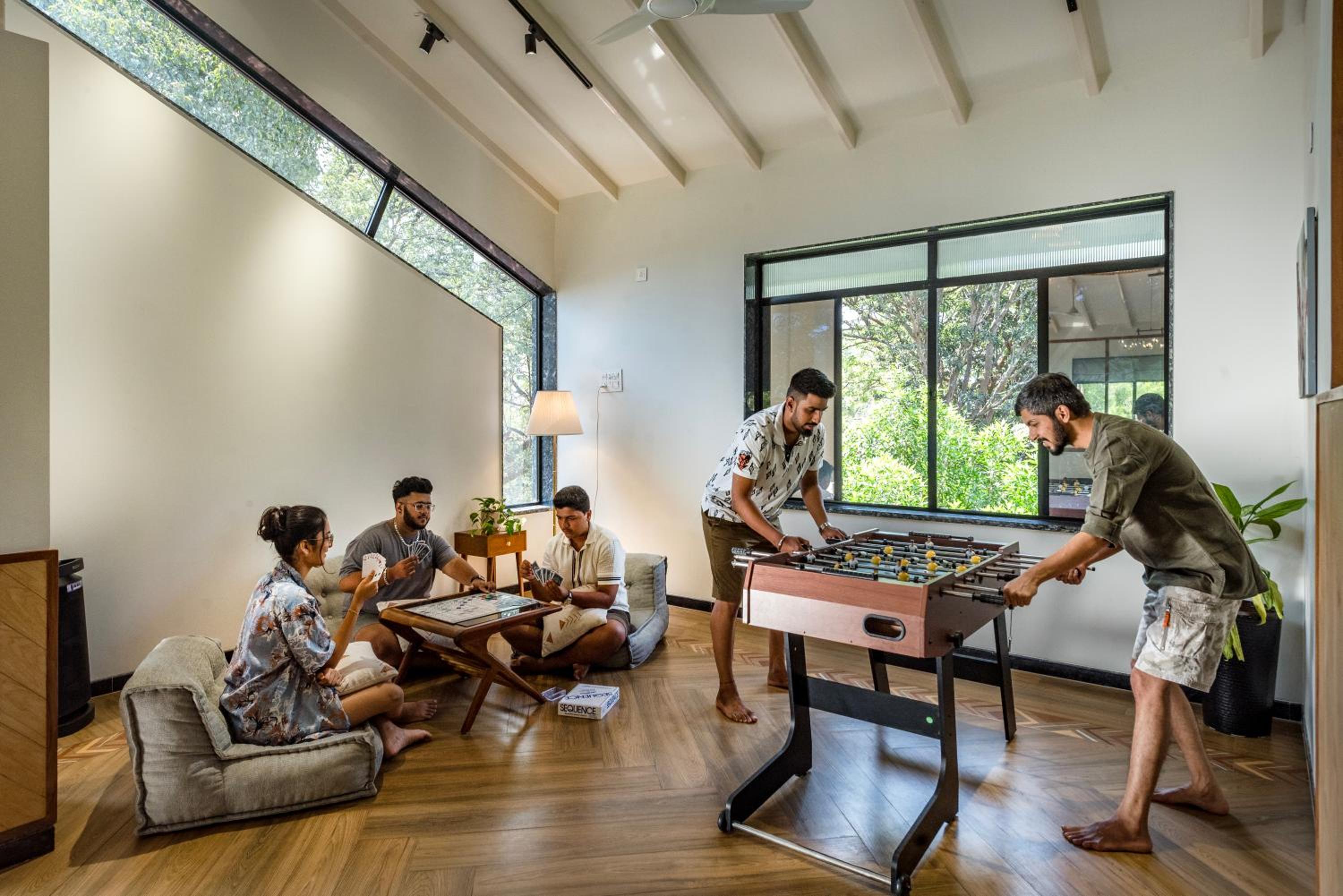 SaffronStays Arabella - 4BR bohemian pool villa with sunken lounge, foosball, PS4 & mango orchard views in Alibaug