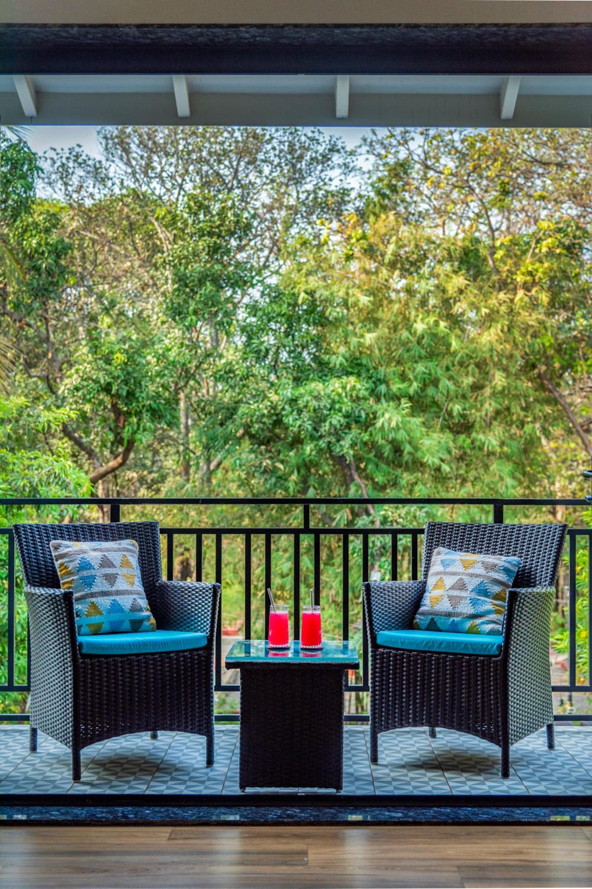 SaffronStays Arabella - 4BR bohemian pool villa with sunken lounge, foosball, PS4 & mango orchard views in Alibaug