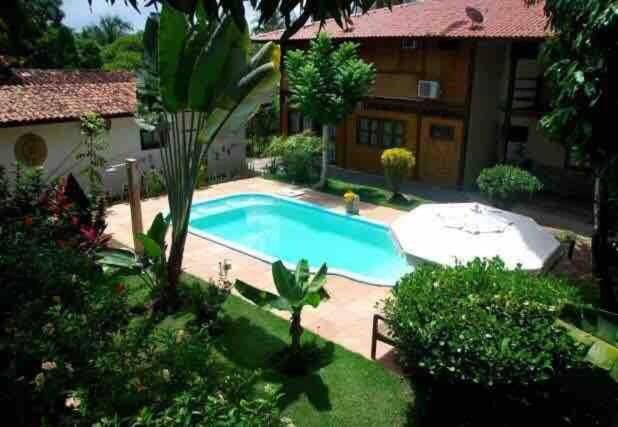 Flat Iansã em condomínio beira-mar com cozinha gourmet na varanda e piscina