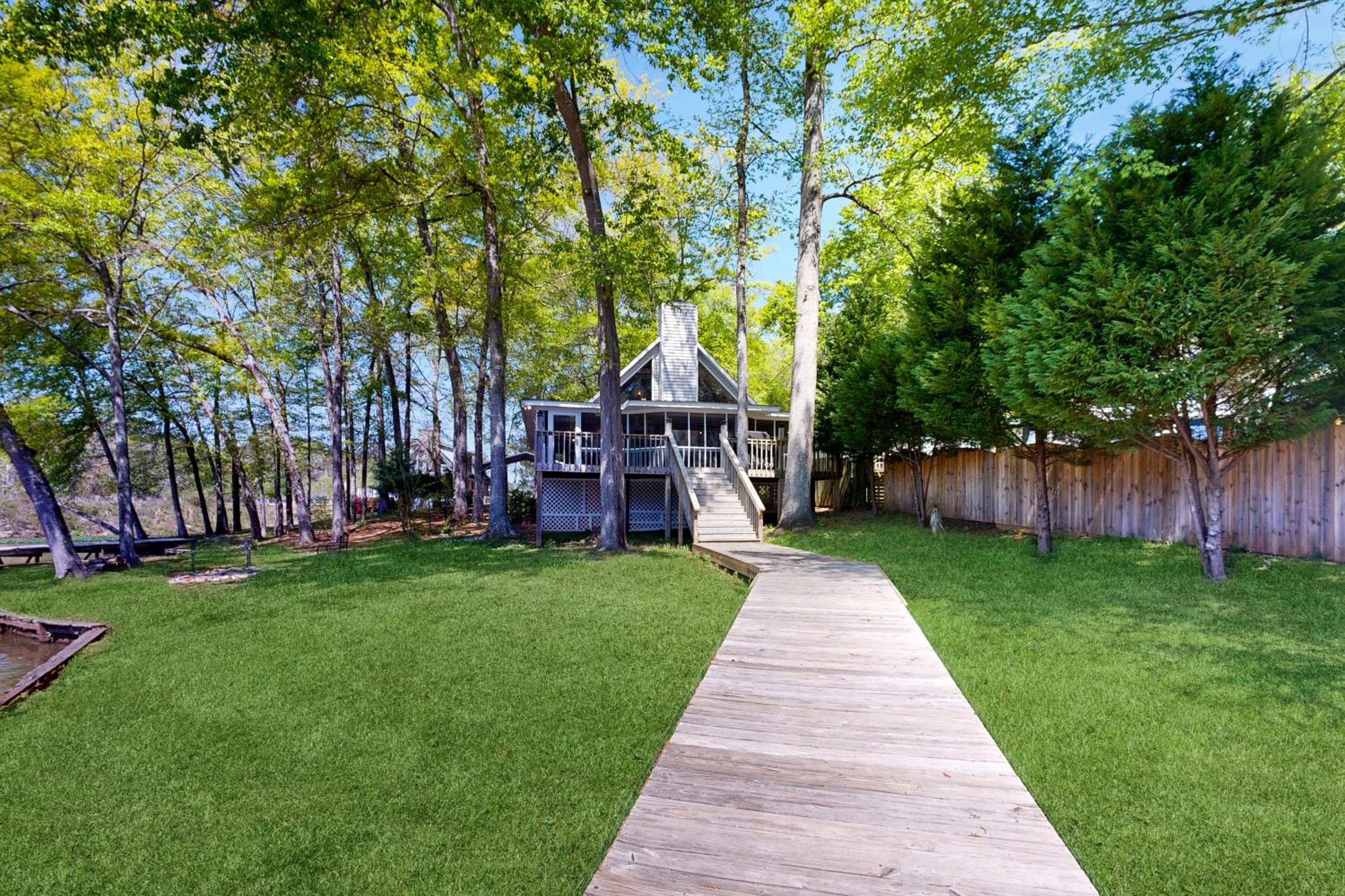 Boat Dock and Waterfront Fire Pit Lake Sinclair Gem