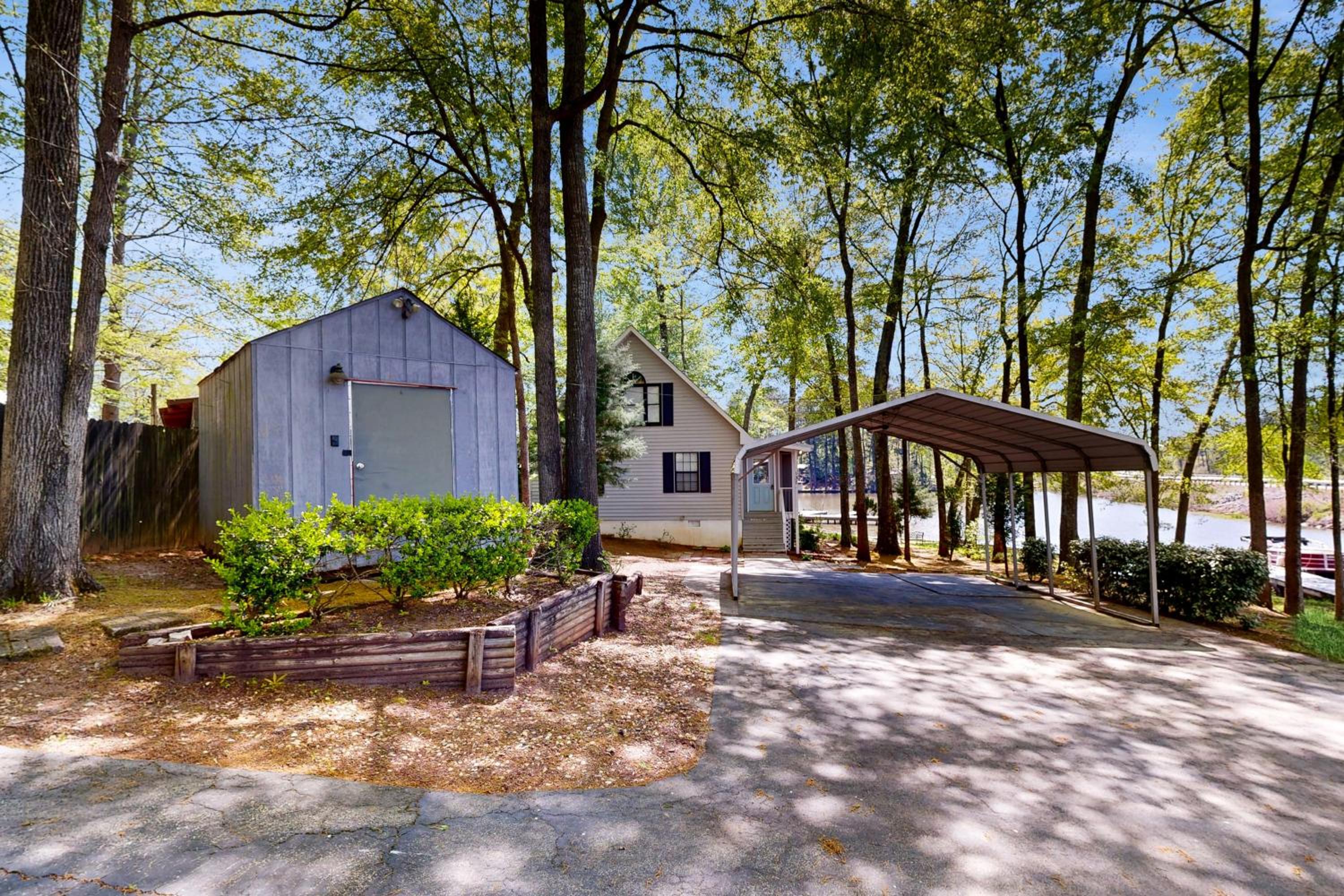 Boat Dock and Waterfront Fire Pit Lake Sinclair Gem