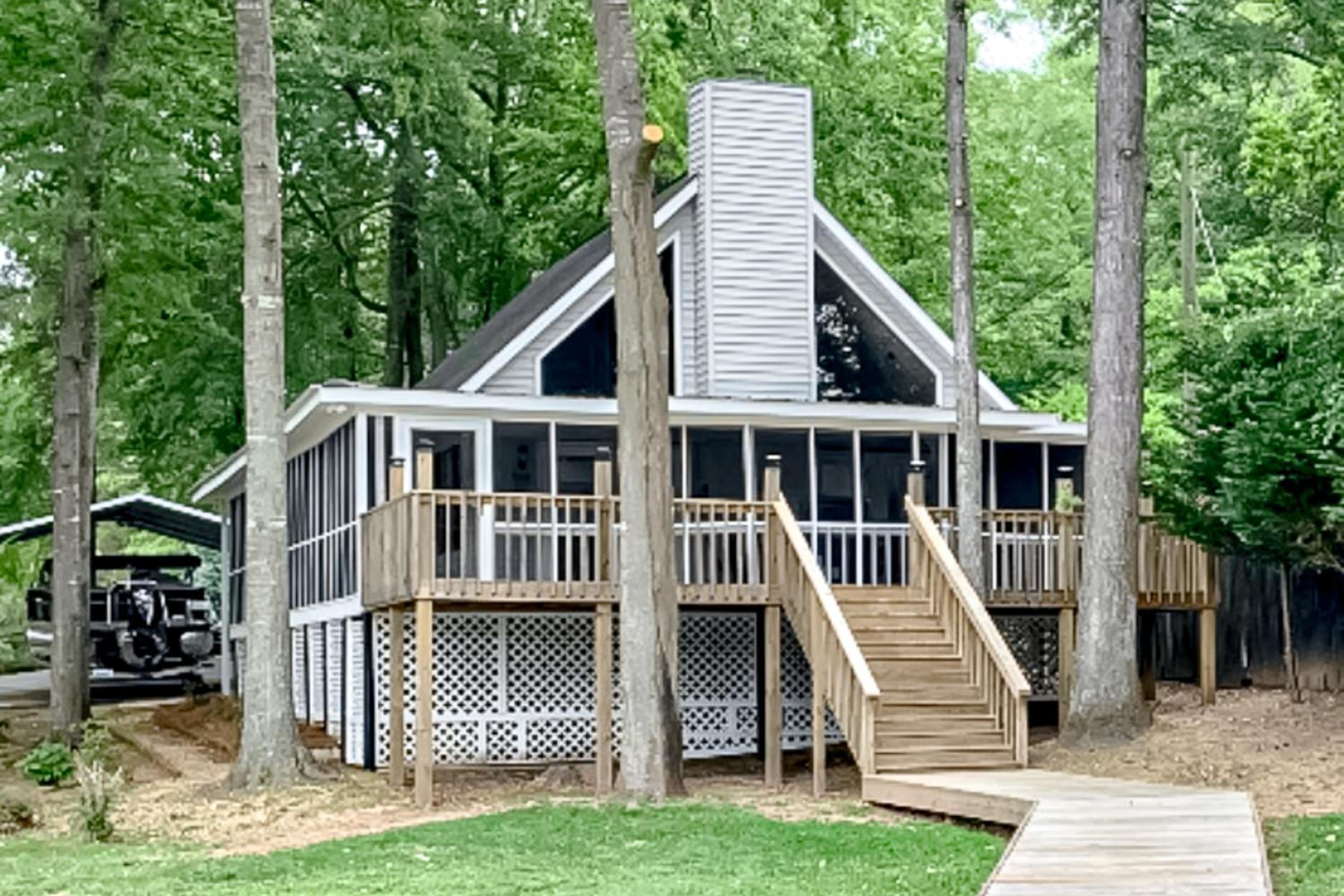 Boat Dock and Waterfront Fire Pit Lake Sinclair Gem