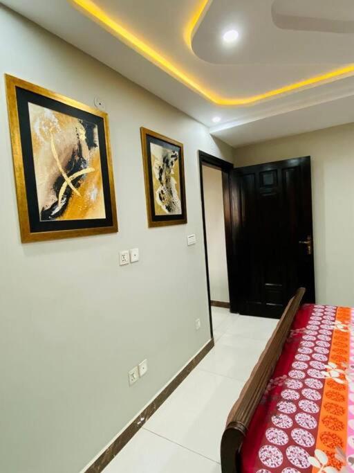 Bahria Town Lahore - NEXT INN Apartment Tailored To Your Highest Standards 403 view 4