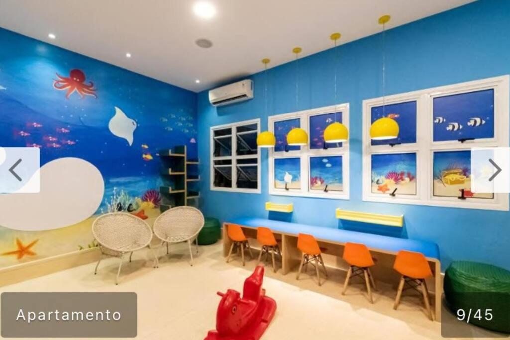 Flat em resort - pé na areia, Camboinhas
