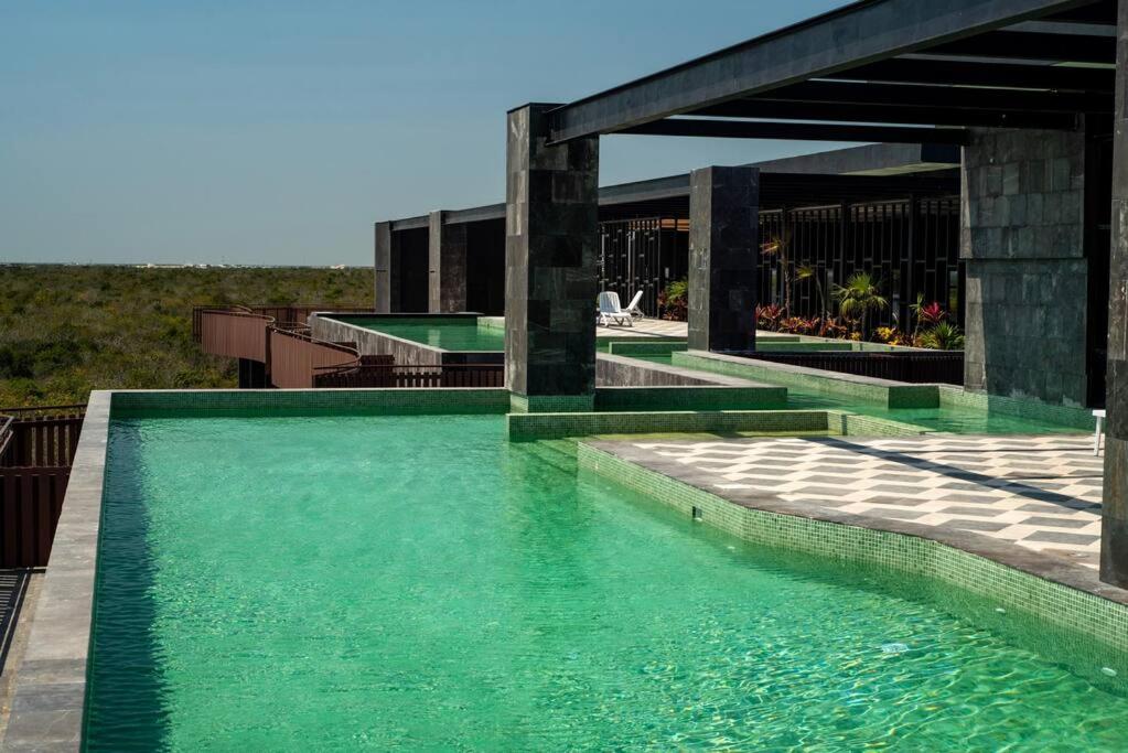 Seascape apartment near the beach with a sea-view rooftop and infinity pool