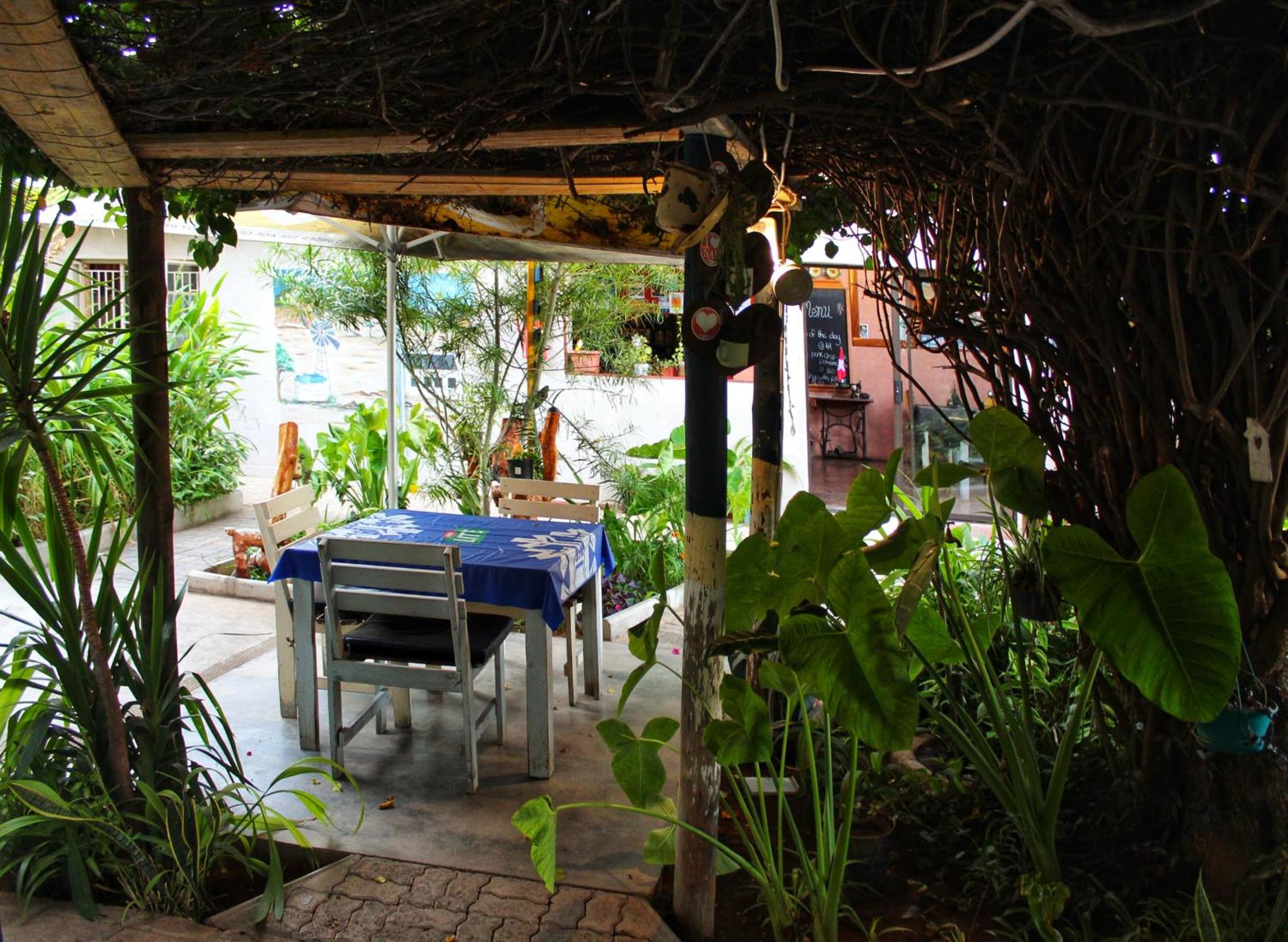 Farmhouse Boutique Backyard Rooms