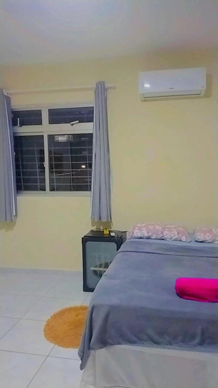 Quartos em apartamento rústico e aconchegante