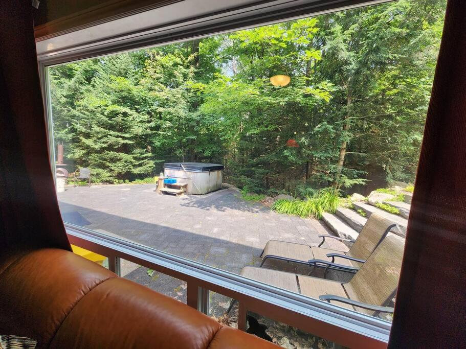 The Hidden Porch at Sir Sam's (hot tub & sauna)