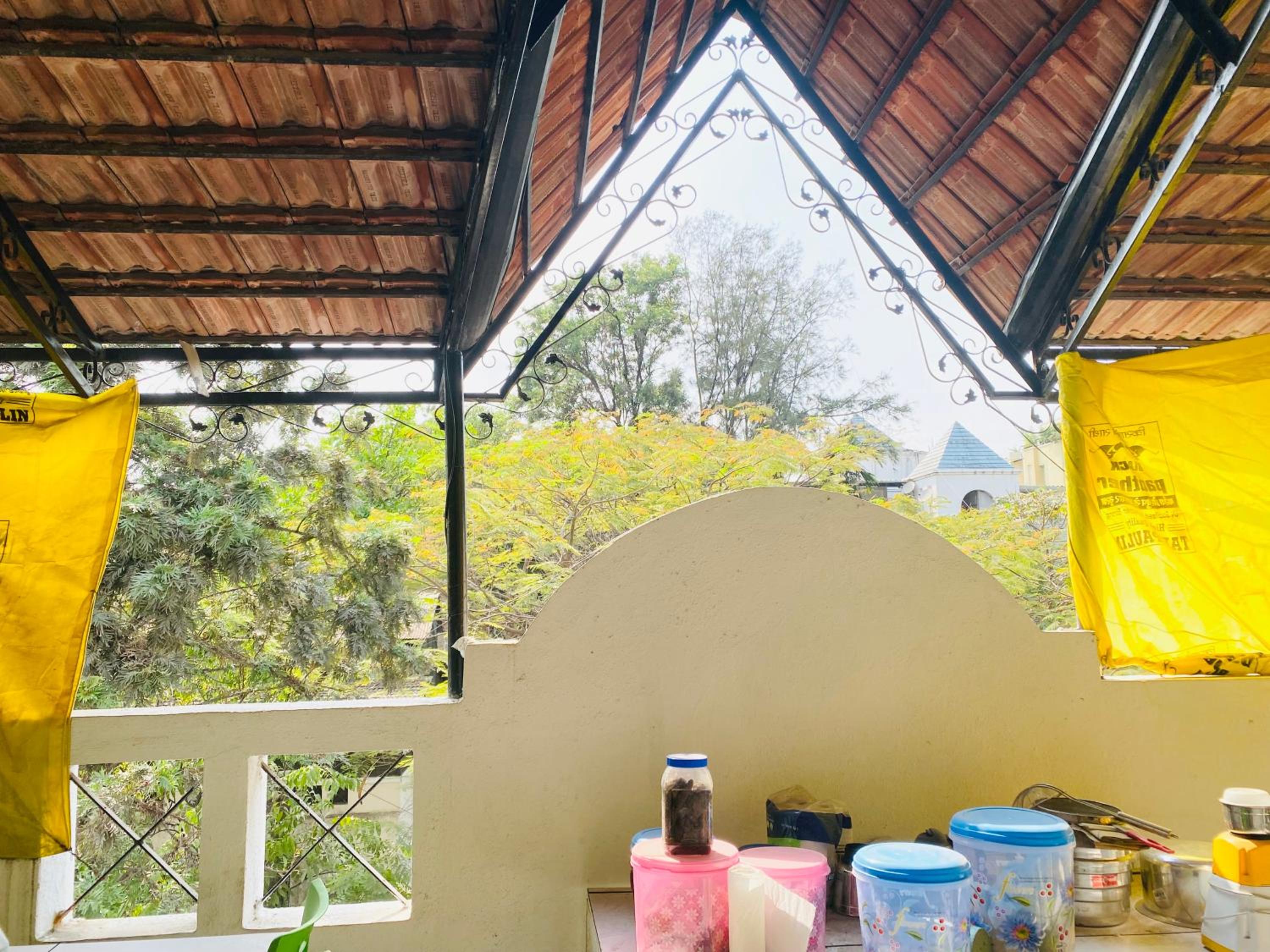 Budget Private Ac Room with Kitchen Near Osho Garden