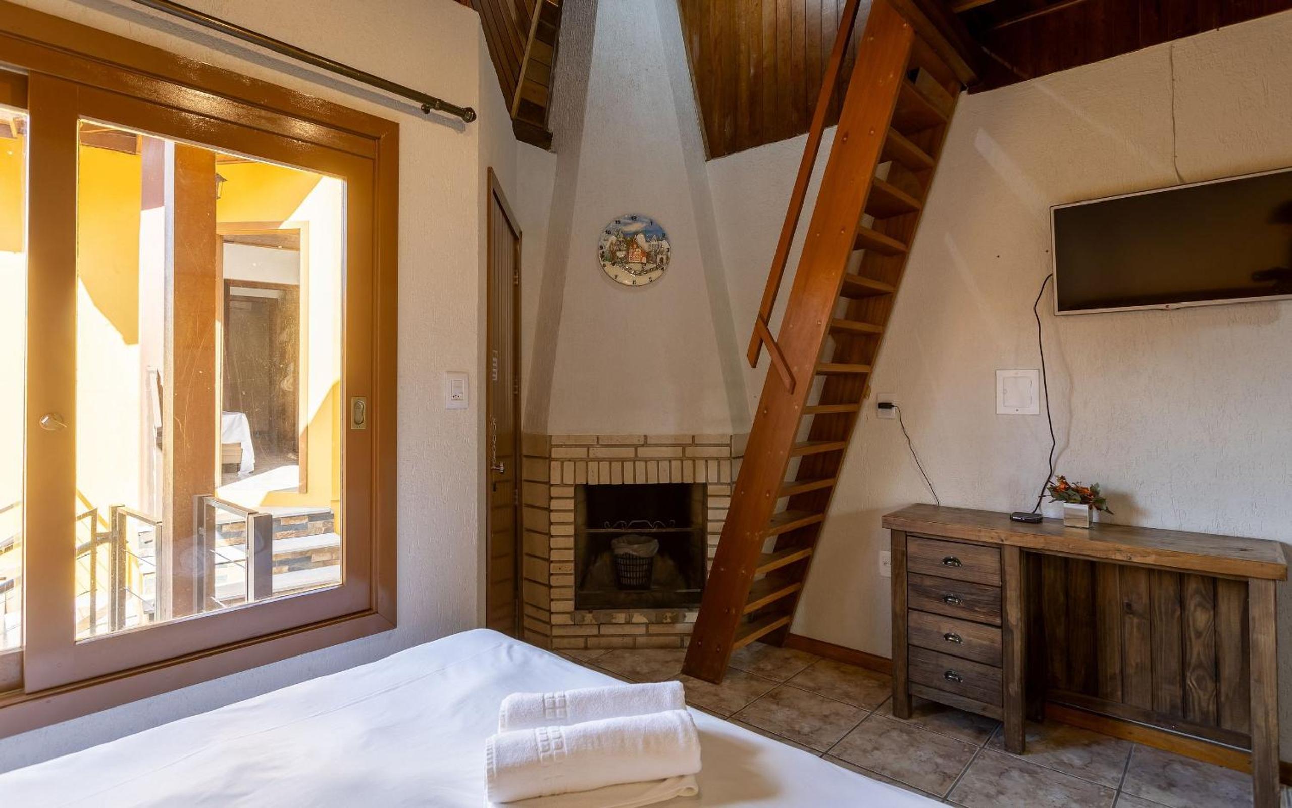 LOCAR-IN GRAMADO - Chalés e Apartamentos Hill Top Centro