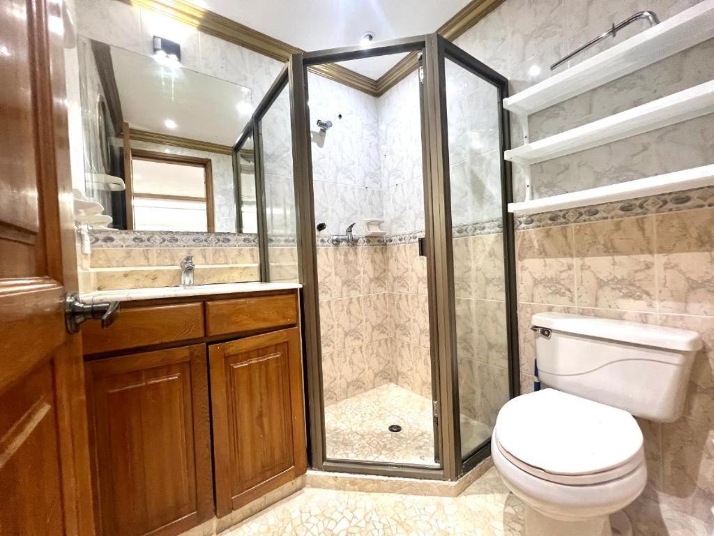 Habitación de lujo con aire acondicionado en condominio privado