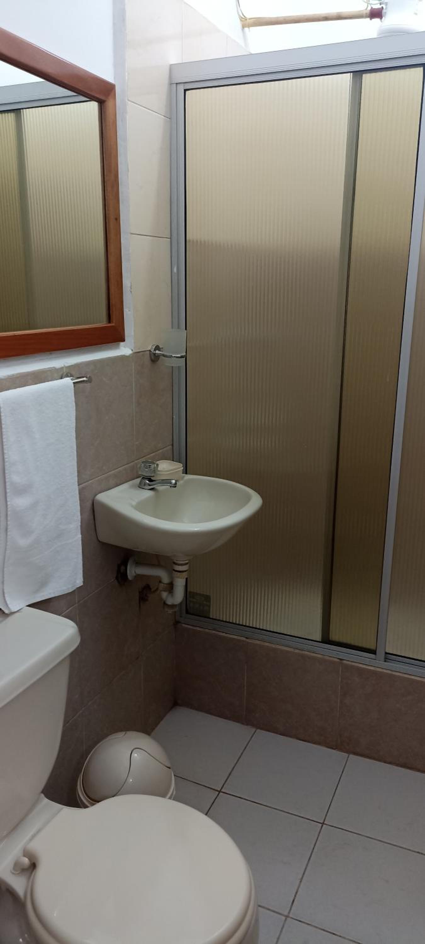 Teresita's House Suites con cocina privada , ideal para parejas, AC, wifi agua caliente, cerca del aeropuerto, a pocos pasos del malecón San Cristóbal