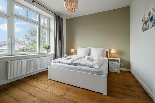Ferienwohnung Gut Hardesby - großzügig mit Kamin & tollem Garten