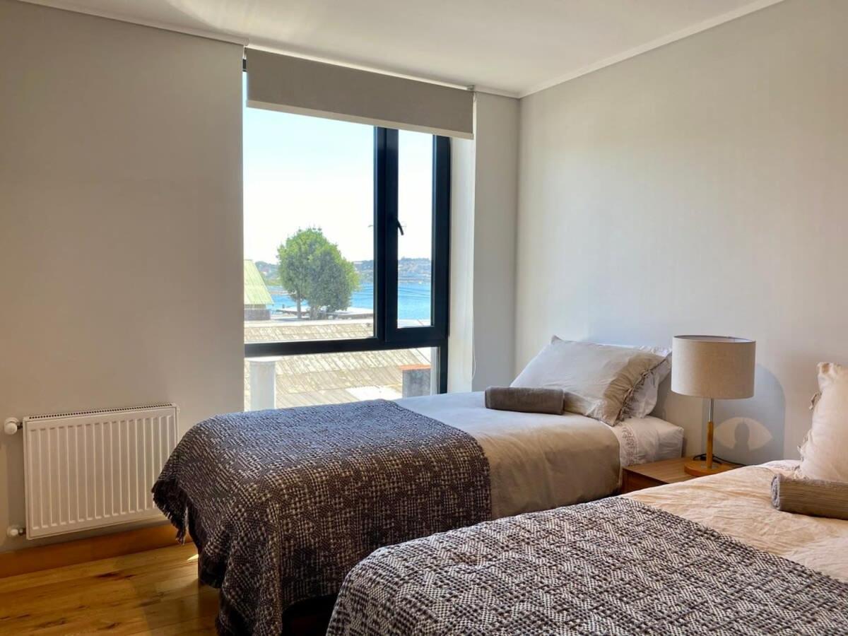 HOM I Depto 3D2B con 02Parking y Terraza en Puerto Varas view 3