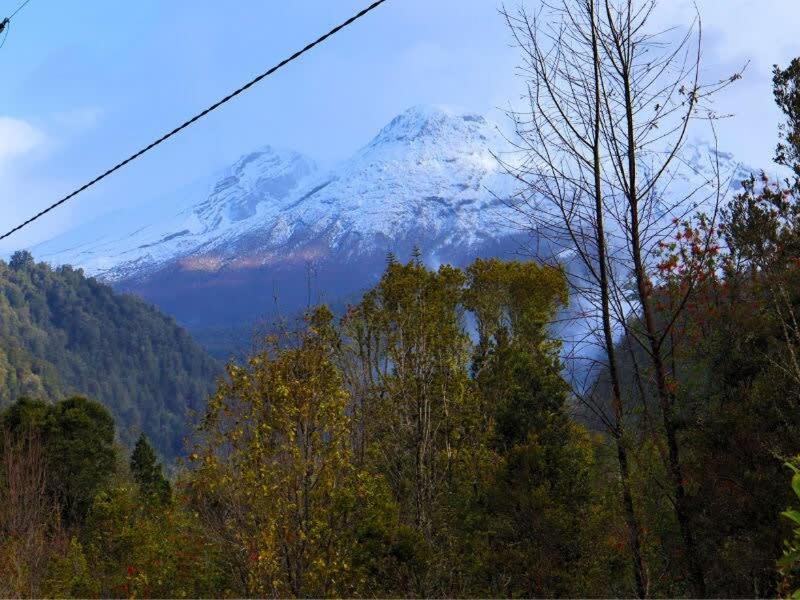 HOM I Cabaña La Ensenada vista parcial al Volcán