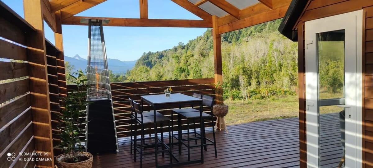 HOM I Cabaña La Ensenada vista parcial al Volcán