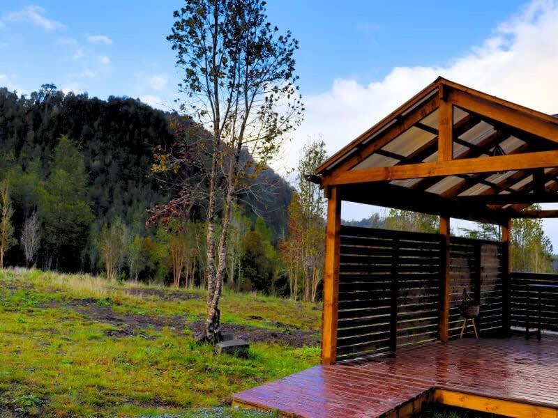 HOM I Cabaña La Ensenada vista parcial al Volcán