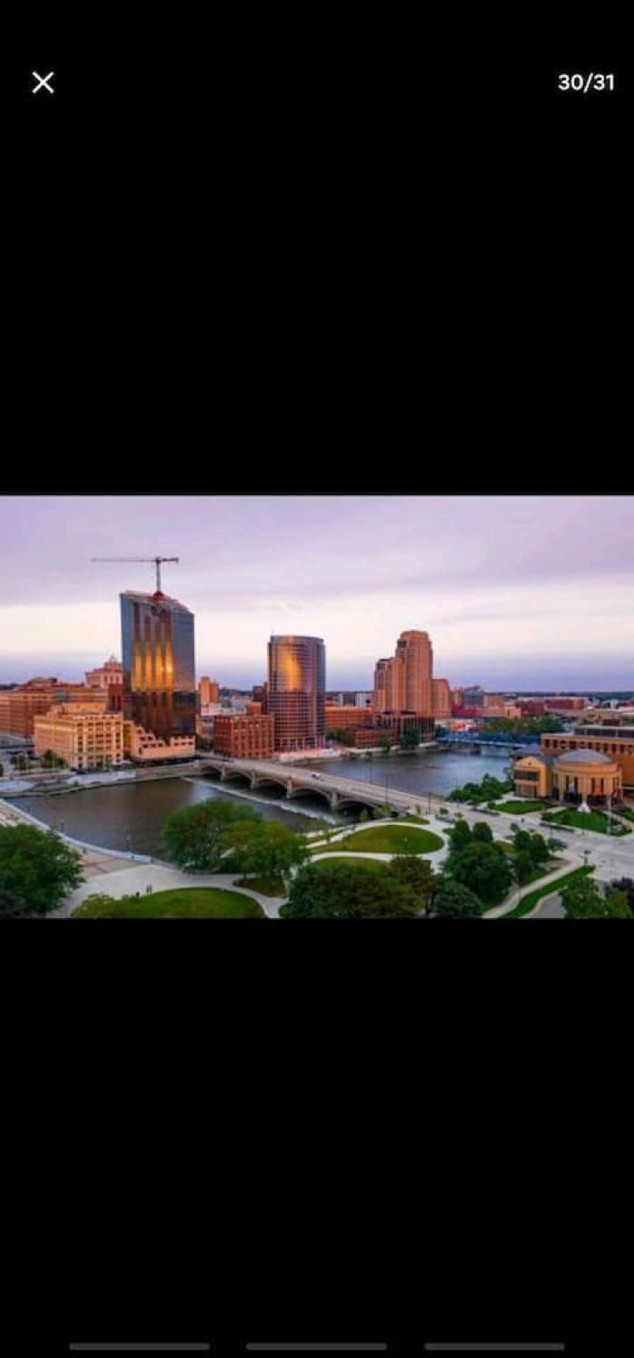 Downtown GR Gem Sleeps 16 Gameroom Huge Backyard view 2