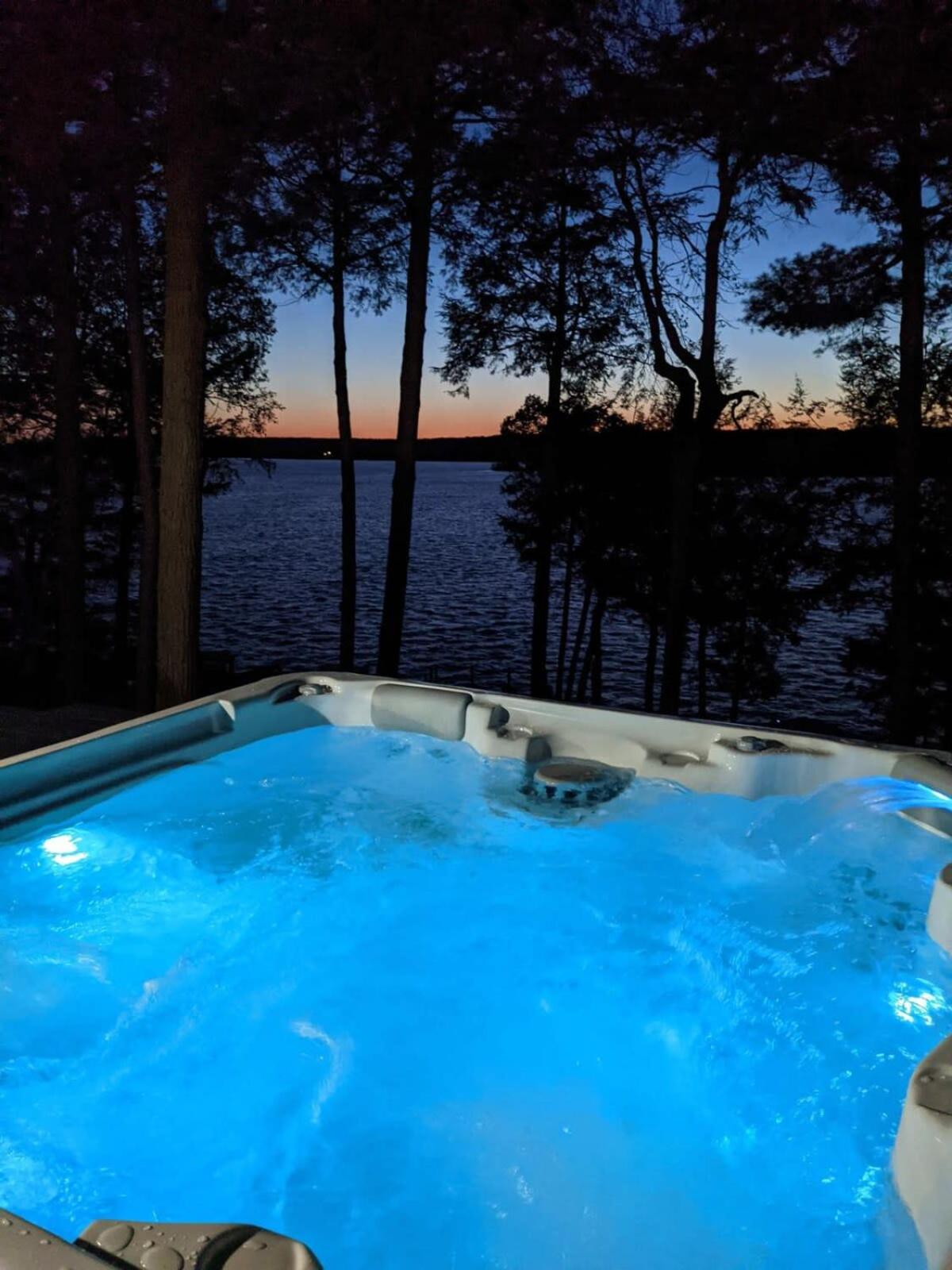 Waterfront open concept dream cottage with hot tub
