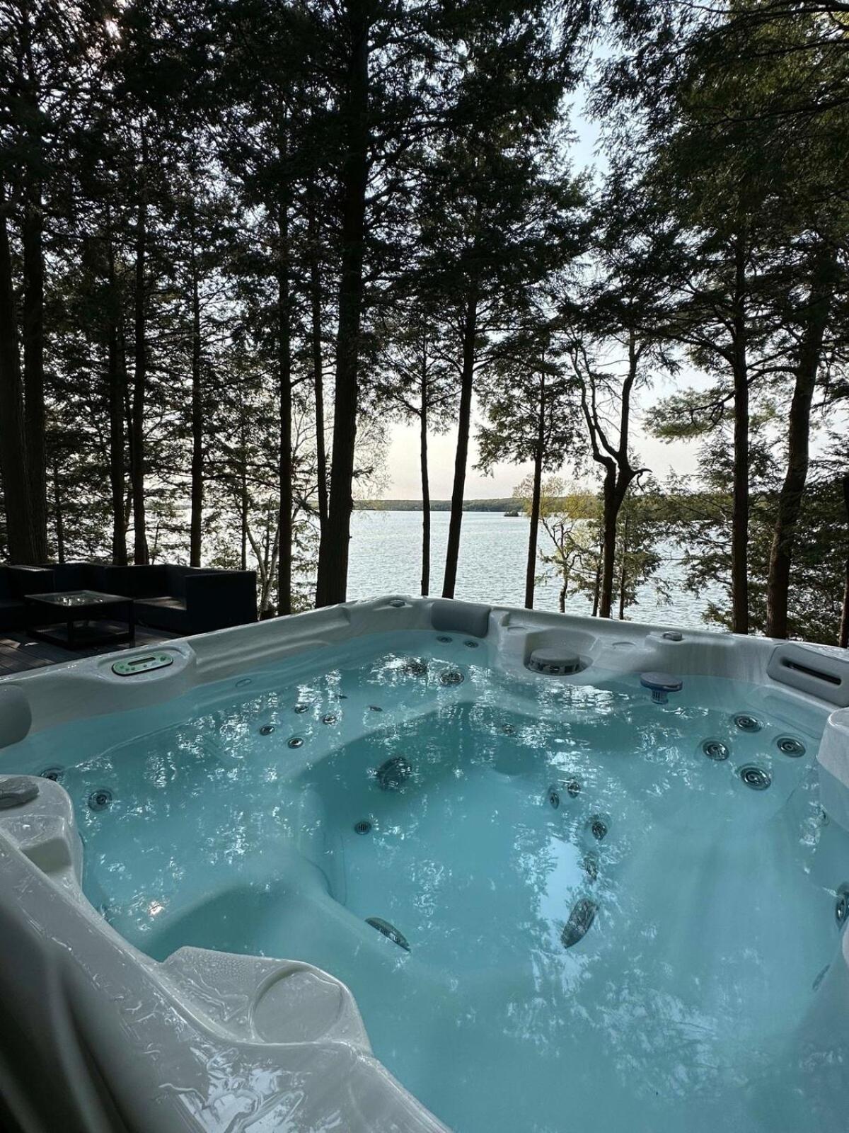 Waterfront open concept dream cottage with hot tub
