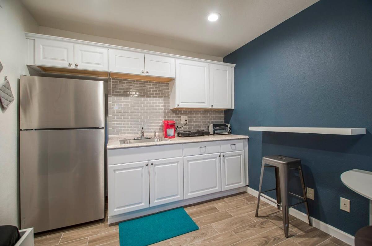 34B- Modern studio condo heated pool and dog park