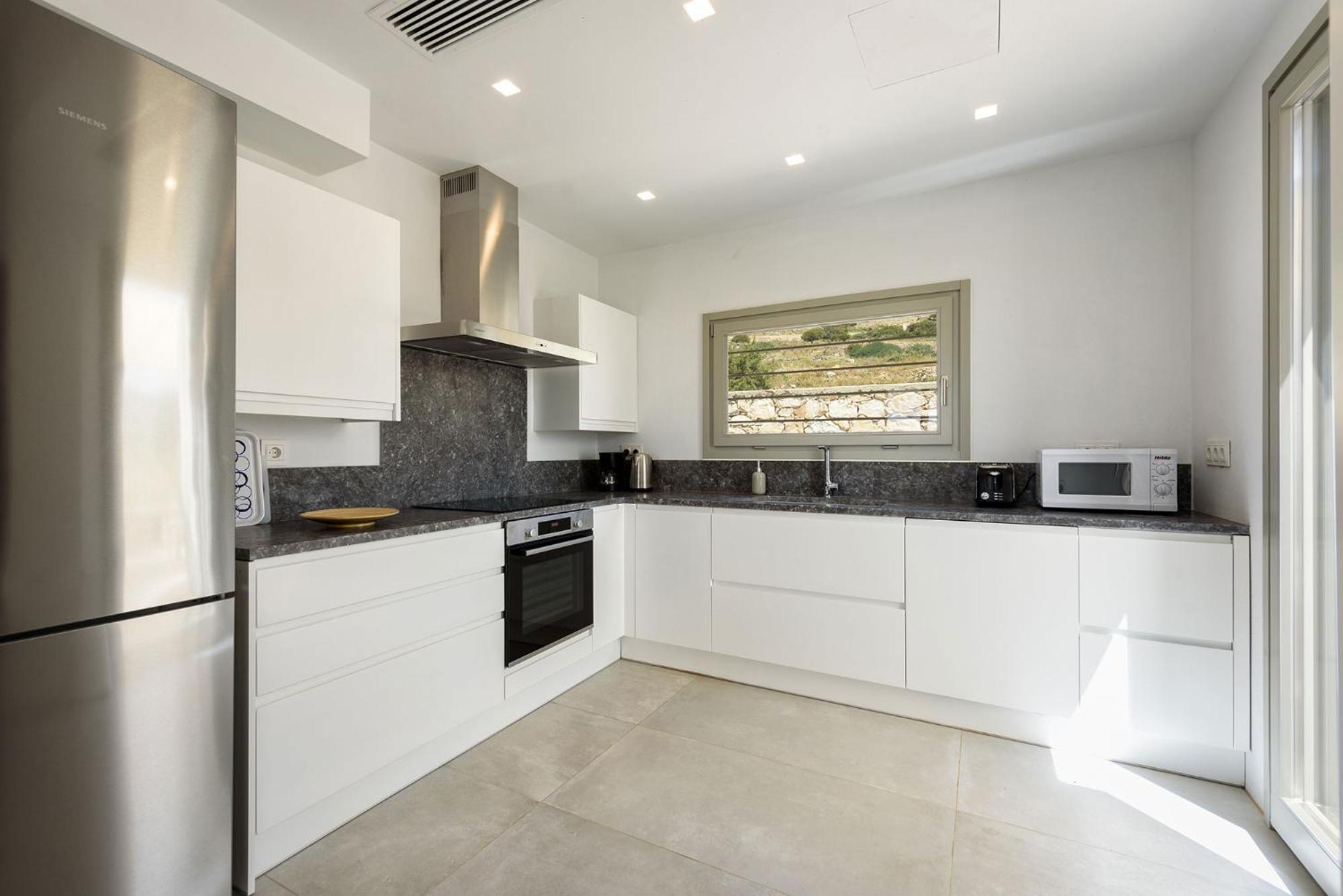 Outstanding new villa with great pool area and panoramic sea view