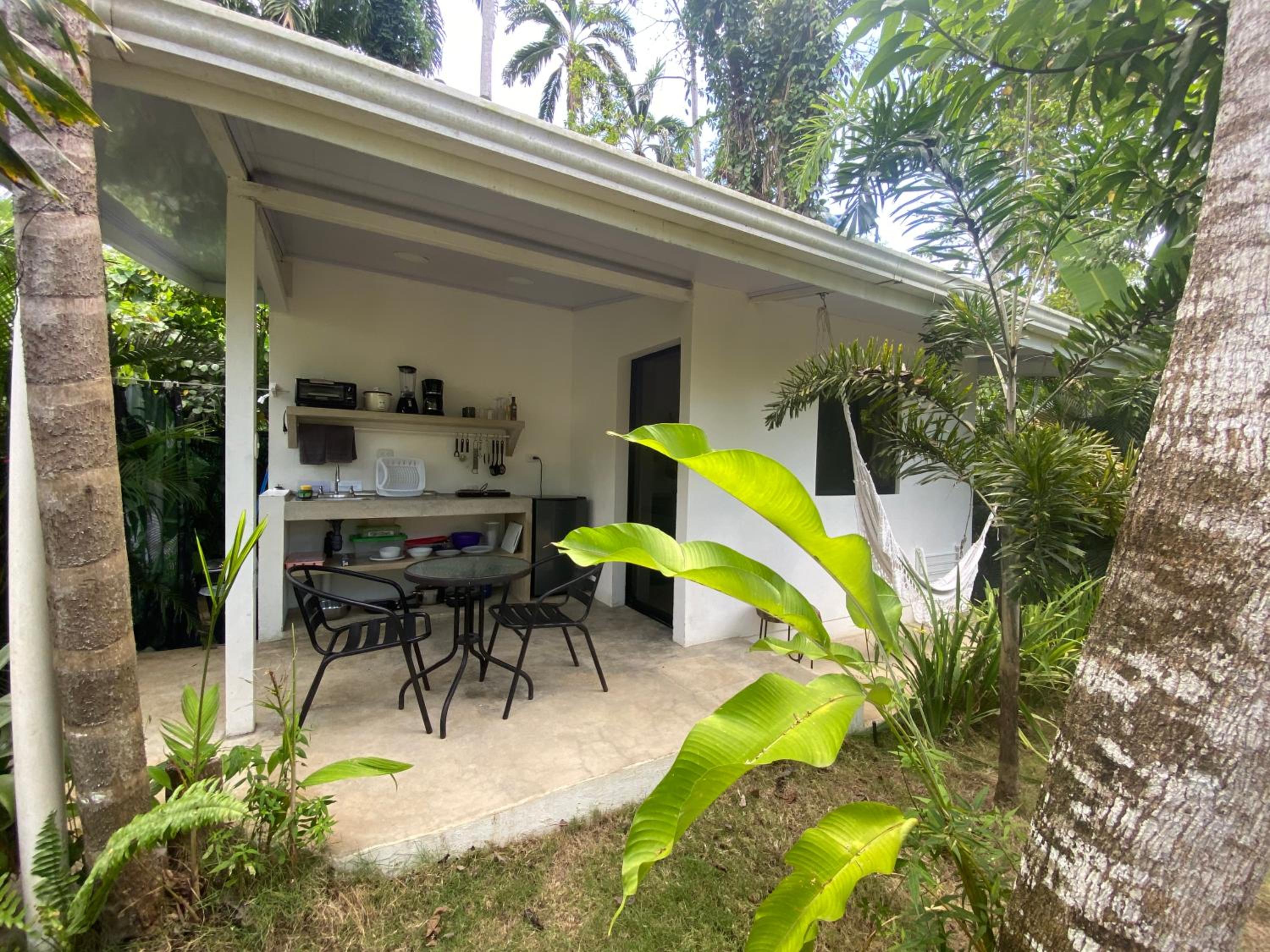 Jungle apartment with bathtub and outdoor shower