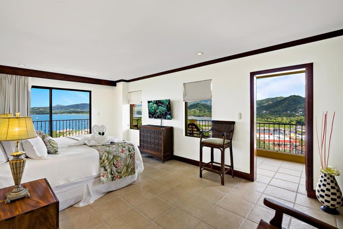 Remodeled Top-Floor Condo with Stunning Wrap-Around Balcony Offering Mountain, Ocean & Marina Views