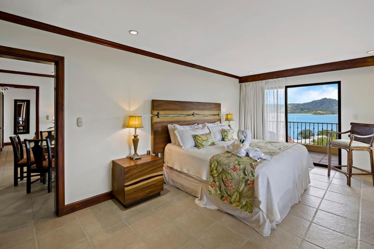 Remodeled Top-Floor Condo with Stunning Wrap-Around Balcony Offering Mountain, Ocean & Marina Views