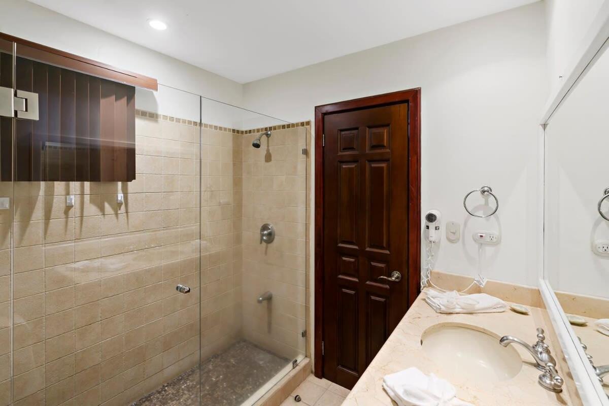 Remodeled Top-Floor Condo with Stunning Wrap-Around Balcony Offering Mountain, Ocean & Marina Views