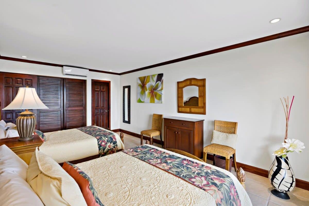 Remodeled Top-Floor Condo with Stunning Wrap-Around Balcony Offering Mountain, Ocean & Marina Views