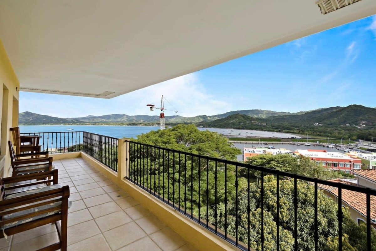 Remodeled Top-Floor Condo with Stunning Wrap-Around Balcony Offering Mountain, Ocean & Marina Views