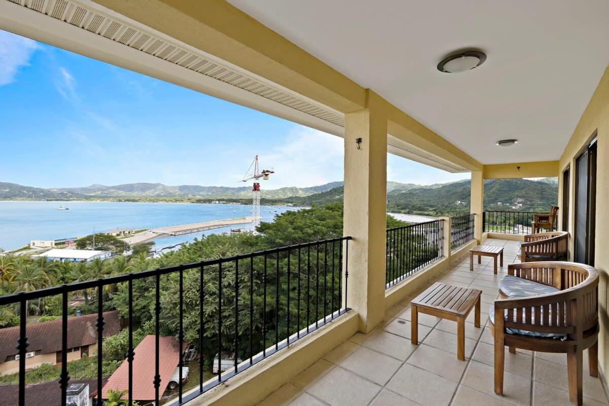 Remodeled Top-Floor Condo with Stunning Wrap-Around Balcony Offering Mountain, Ocean & Marina Views