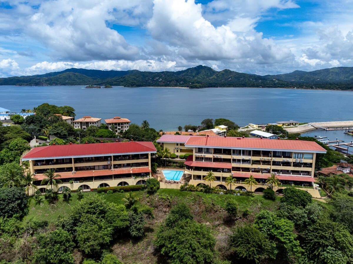 Remodeled Top-Floor Condo with Stunning Wrap-Around Balcony Offering Mountain, Ocean & Marina Views
